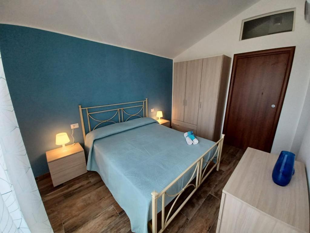 Postel nebo postele na pokoji v ubytování L'Acero di STALL