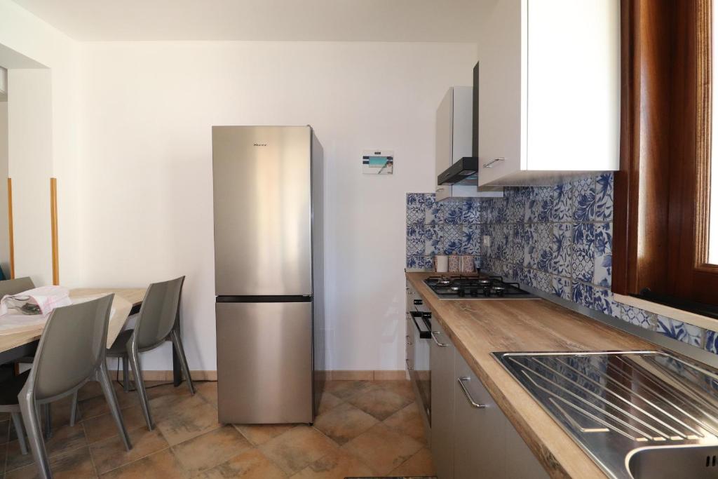 Kuchyňa alebo kuchynka v ubytovaní casa Vincenzo