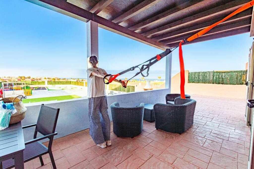 A balcony or terrace at Villa Mini Golf