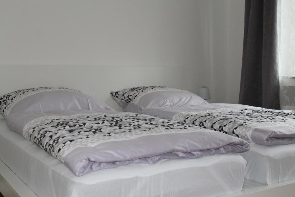 Posteľ alebo postele v izbe v ubytovaní City Apart Düss