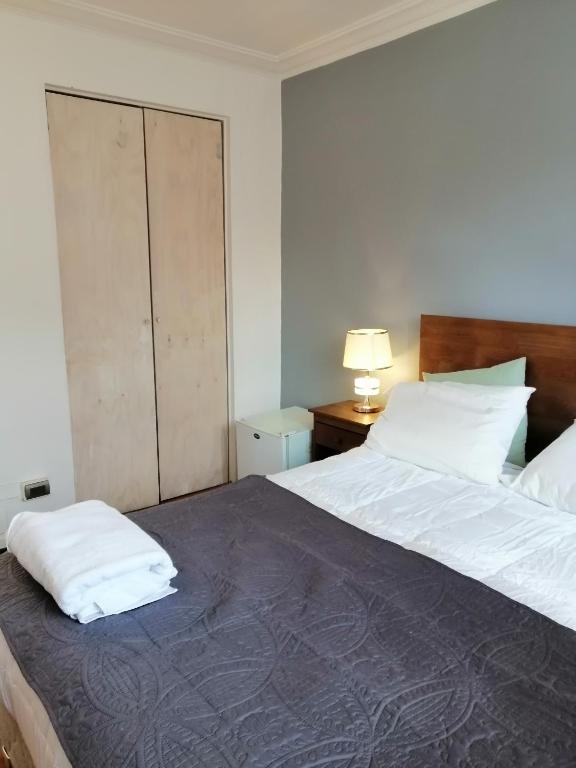 Postel nebo postele na pokoji v ubytování HOSTAL SUZI