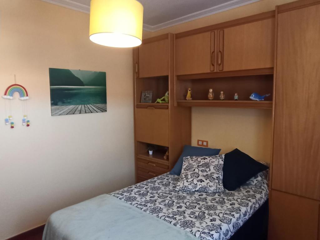 Postel nebo postele na pokoji v ubytování Les Playes, Cimavilla