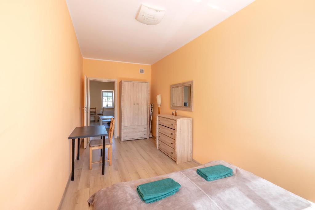 Posteľ alebo postele v izbe v ubytovaní Apartament Gdańsk Stare Miasto przy Neptunie