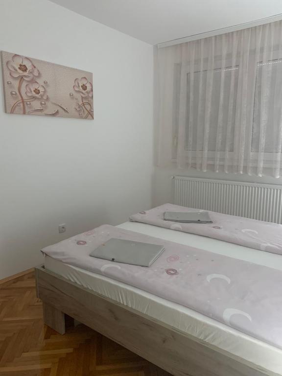 Postel nebo postele na pokoji v ubytování Lana