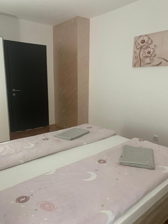 Postel nebo postele na pokoji v ubytování Lana
