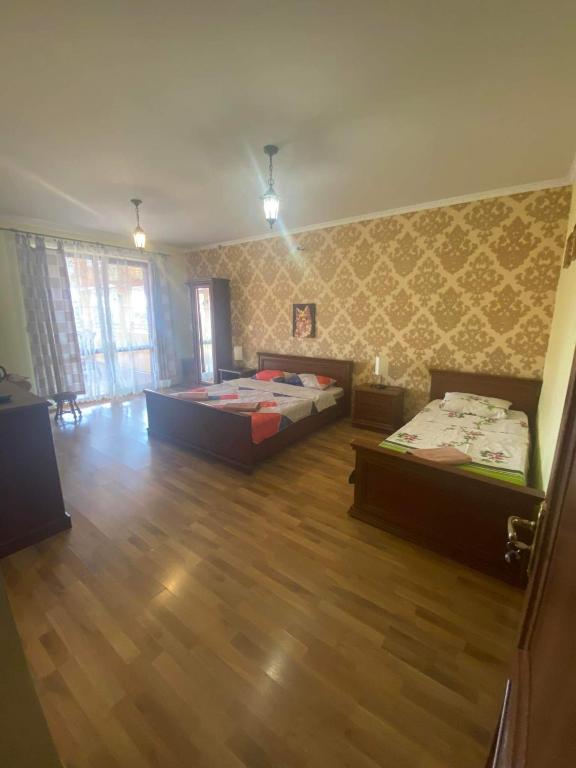 Postel nebo postele na pokoji v ubytování Villa Eden DeLux
