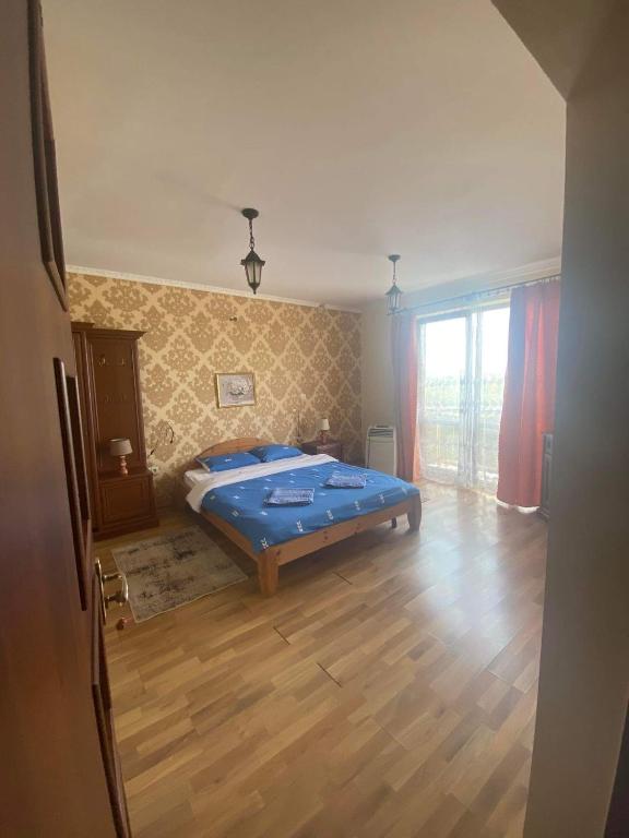 Postel nebo postele na pokoji v ubytování Villa Eden DeLux