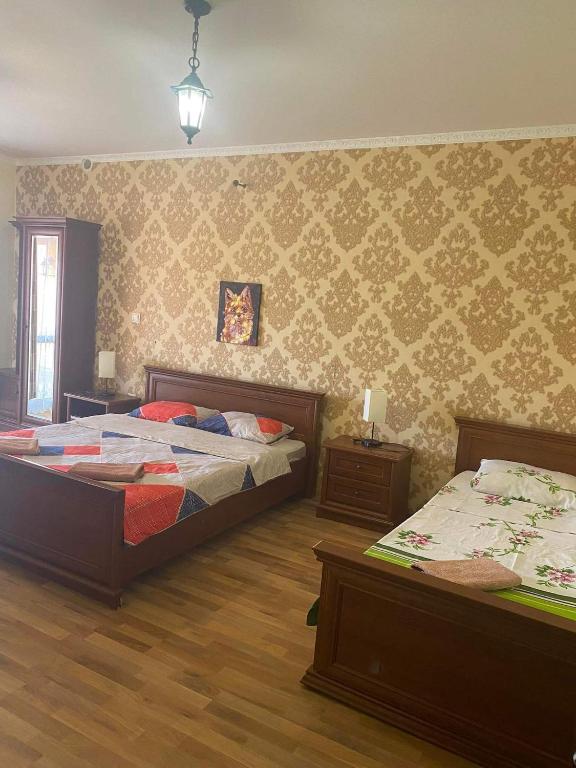 Postel nebo postele na pokoji v ubytování Villa Eden DeLux