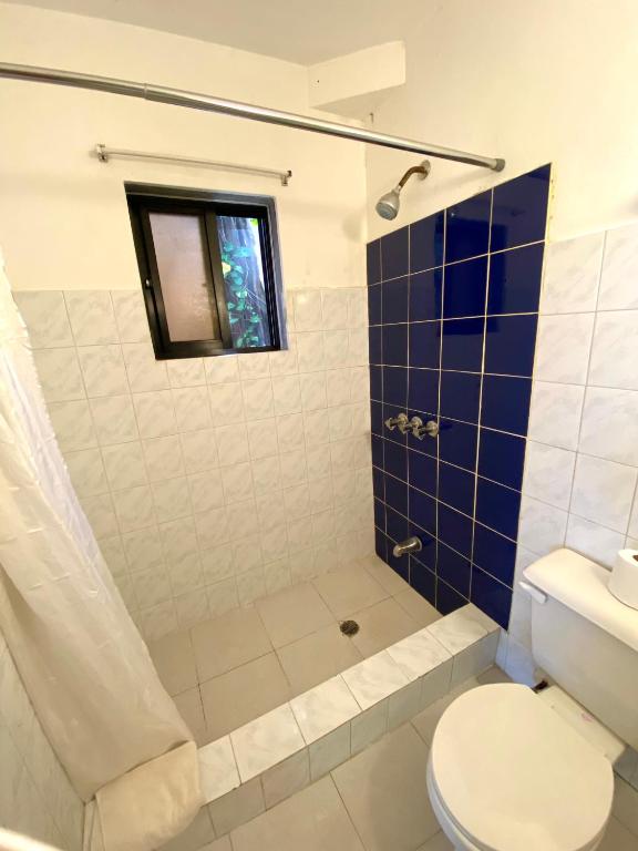 Koupelna v ubytování Hotel Alegria