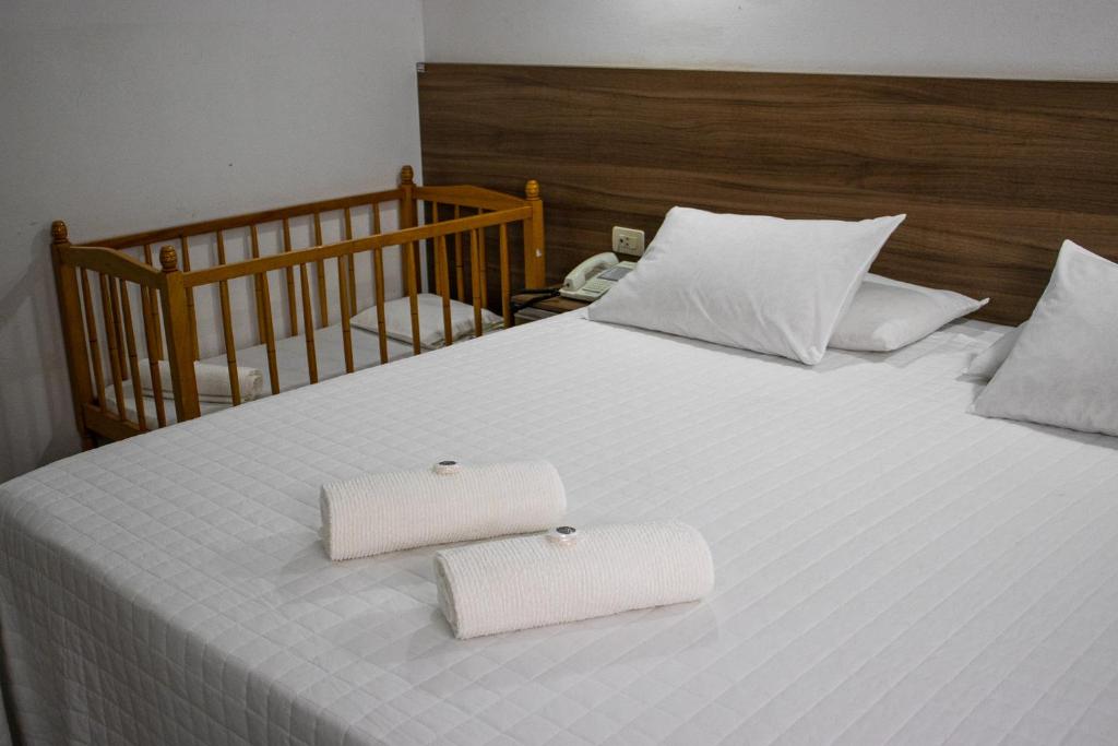 Postel nebo postele na pokoji v ubytování Das Heim Hotel