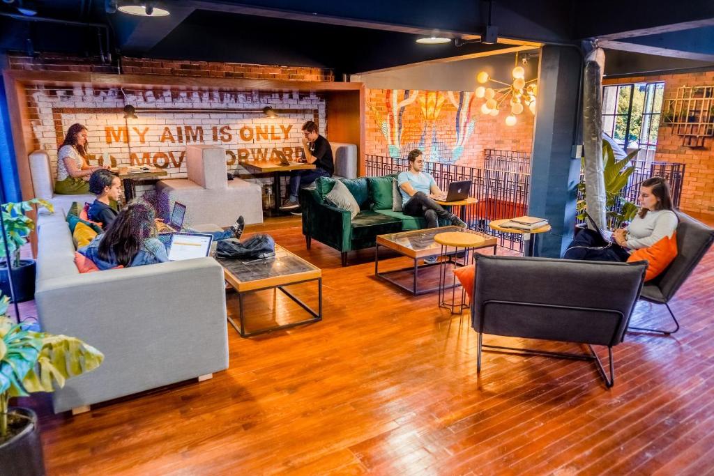 a group of people sitting in a room at Selina Mexico City Downtown in Mexico City