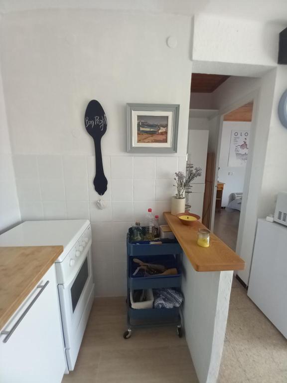 Kuchyň nebo kuchyňský kout v ubytování NIUMAR Acogedor apartamento muy luminoso con terraza