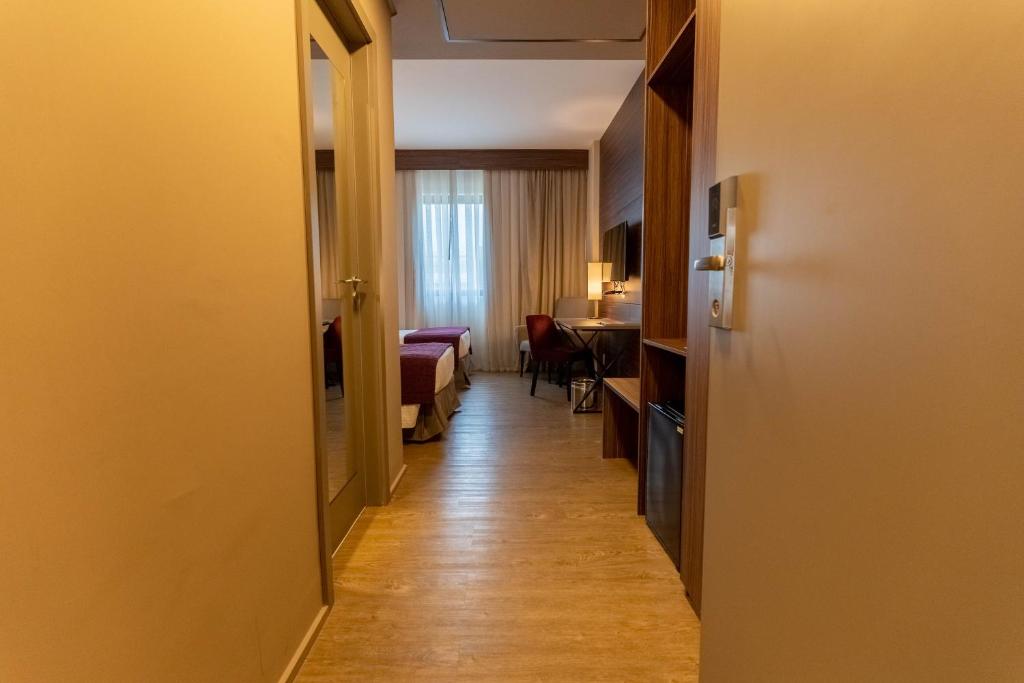 Cama ou camas em um quarto em Royal Palm Tower Anhanguera