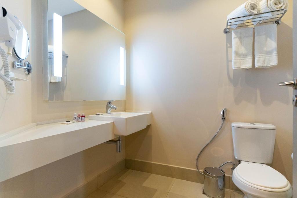 Um banheiro em Royal Palm Tower Anhanguera