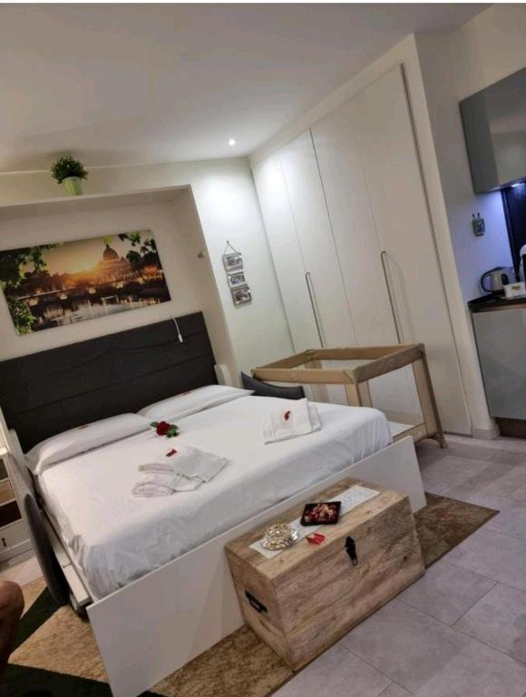 Letto o letti in una camera di La Calla al Colosseo