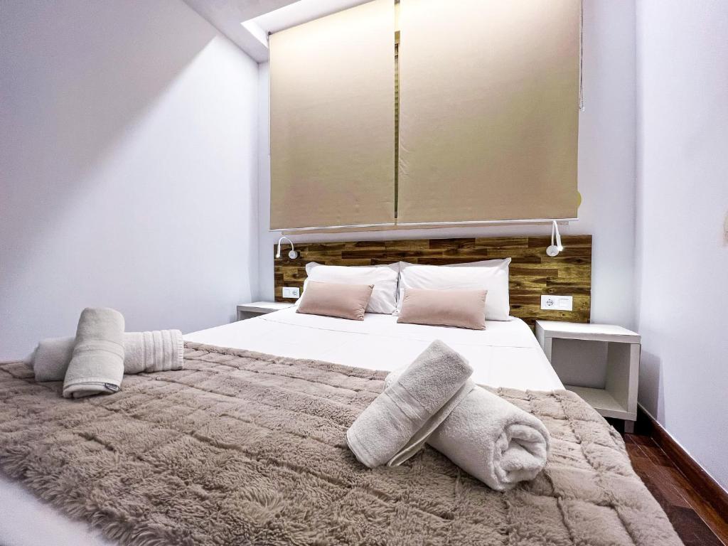 Posteľ alebo postele v izbe v ubytovaní Baron Suites