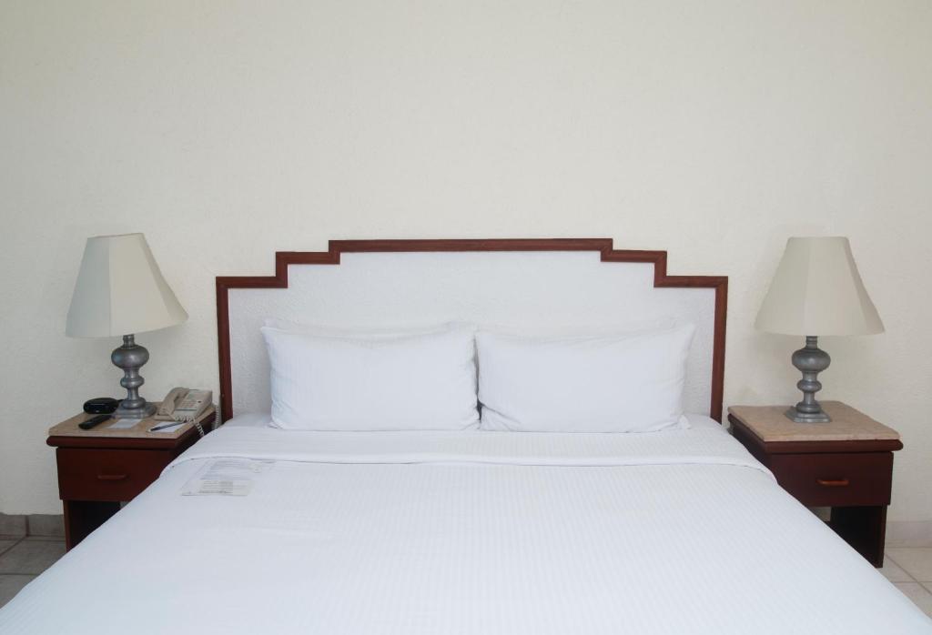 Emporio Ixtapa - with Optional All Inclusive客房内的一张或多张床位