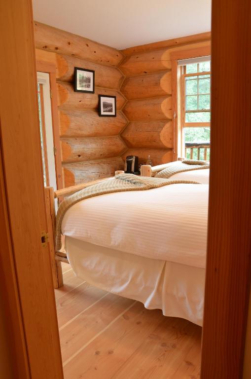 Postel nebo postele na pokoji v ubytování Moberly Lodge