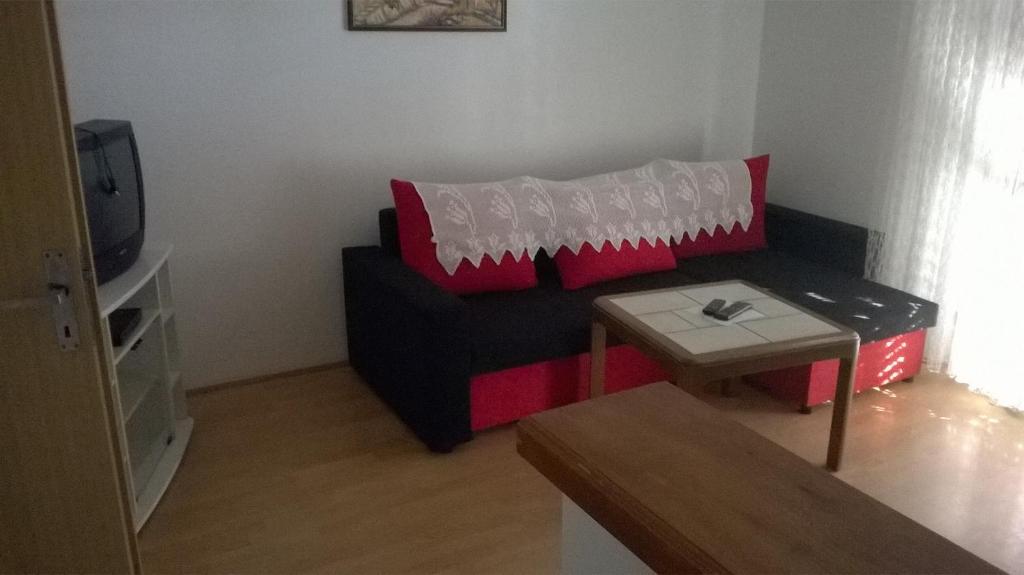 TV a/nebo společenská místnost v ubytování Apartment Barbat 17620c
