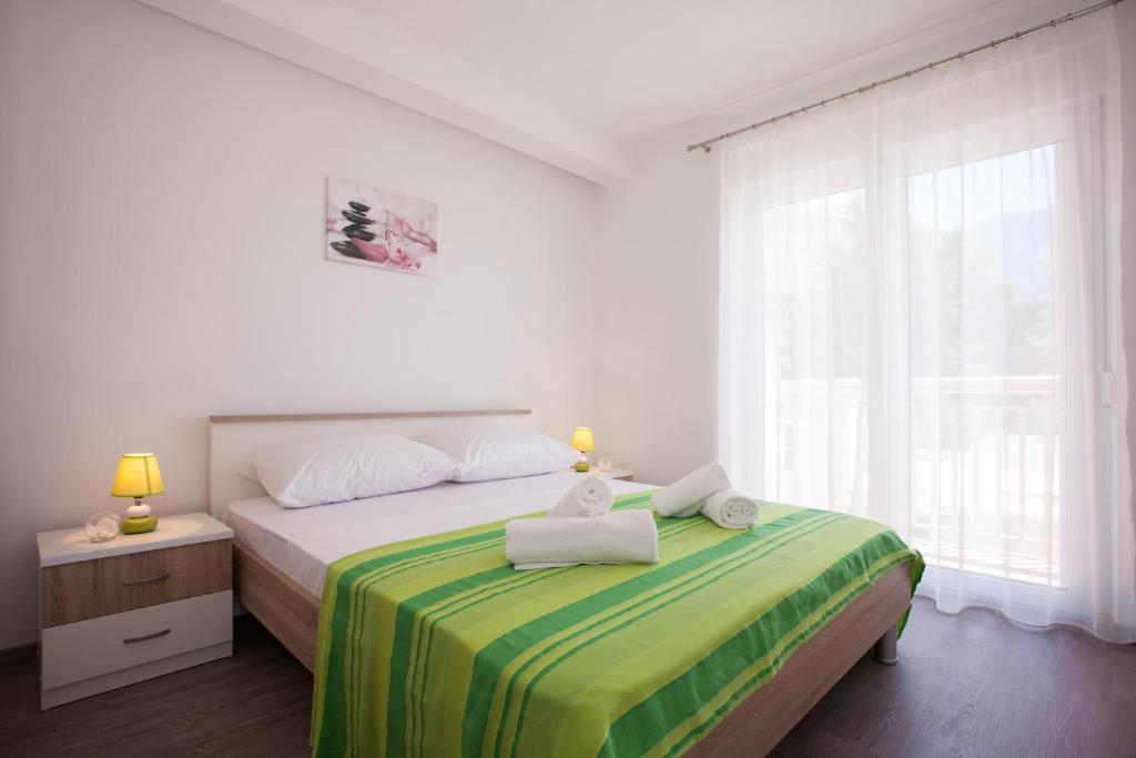 Fotografia z galérie ubytovania Apartments by the sea Baska Voda, Makarska - 17786 v destinácii Baška Voda