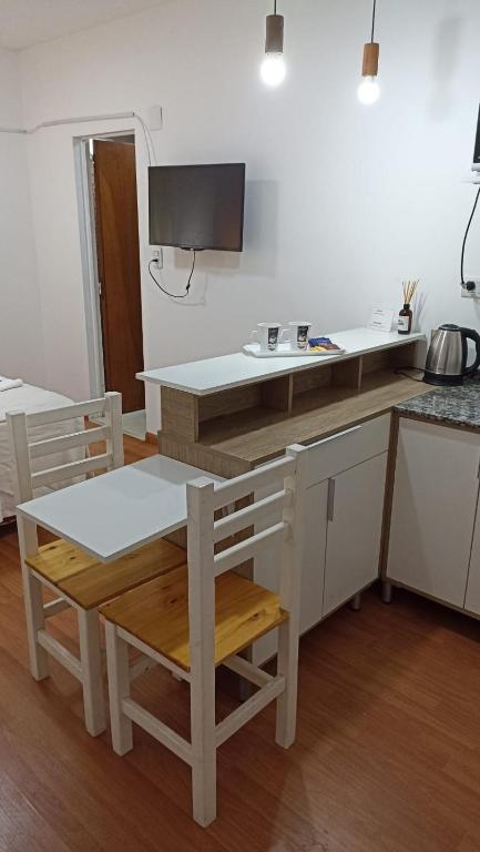 Una cocina o kitchenette en Monoambientes Peatonal - con cochera