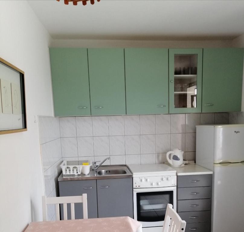 Kuchyň nebo kuchyňský kout v ubytování Apartments by the sea Kustici, Pag - 18248