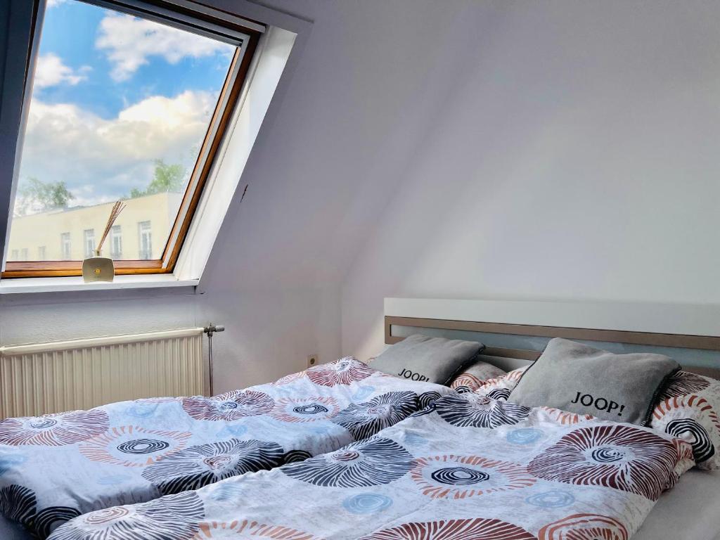 Posteľ alebo postele v izbe v ubytovaní KB Apartment