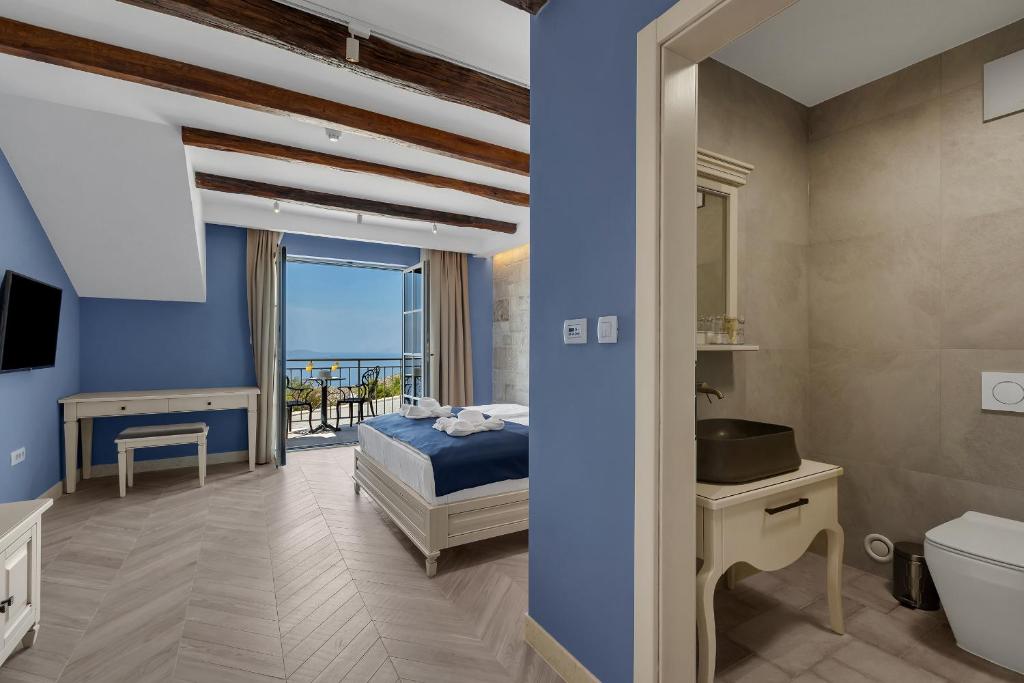Postel nebo postele na pokoji v ubytování Heritage Hotel Liberan