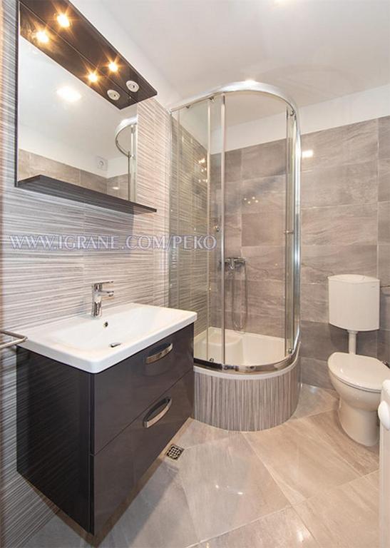 Koupelna v ubytování Apartments by the sea Igrane, Makarska - 18405