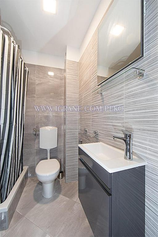 Koupelna v ubytování Apartments by the sea Igrane, Makarska - 18405