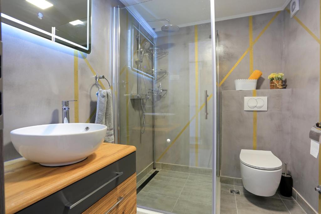 Koupelna v ubytování Apartments by the sea Igrane, Makarska - 18405