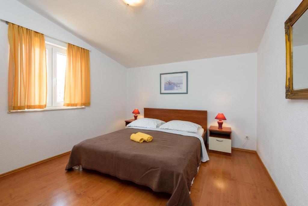 Fotografia z galérie ubytovania Apartments by the sea Seget Vranjica, Trogir - 18229 v Seget Vranjici
