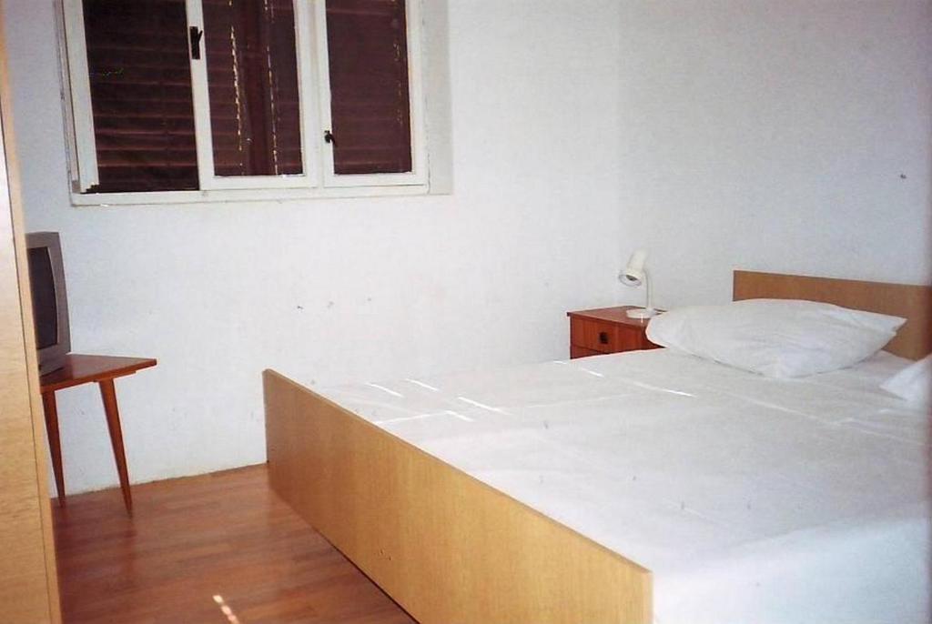 Posteľ alebo postele v izbe v ubytovaní Apartments by the sea Srima - Vodice, Vodice - 18470