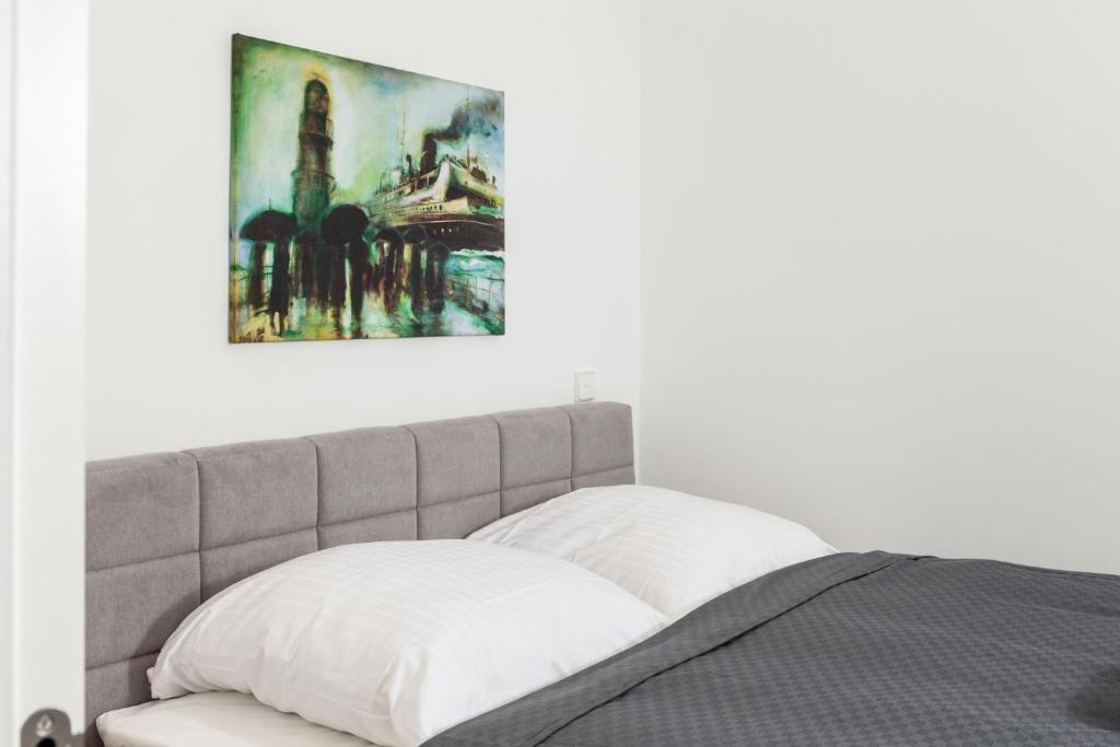 Postel nebo postele na pokoji v ubytování LIGHTHOUSE APPARTEMENTS
