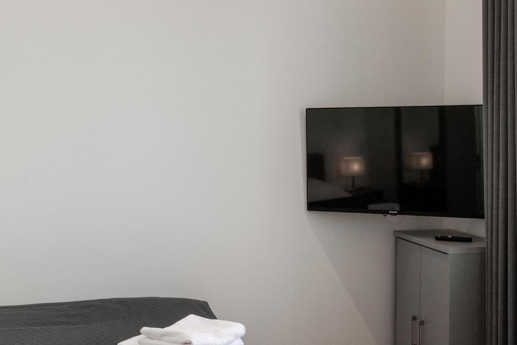 TV a/nebo společenská místnost v ubytování LIGHTHOUSE APPARTEMENTS