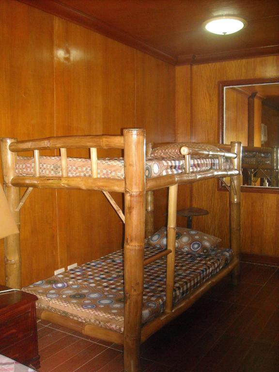 Postel nebo postele na pokoji v ubytování Cebu Guest Inn