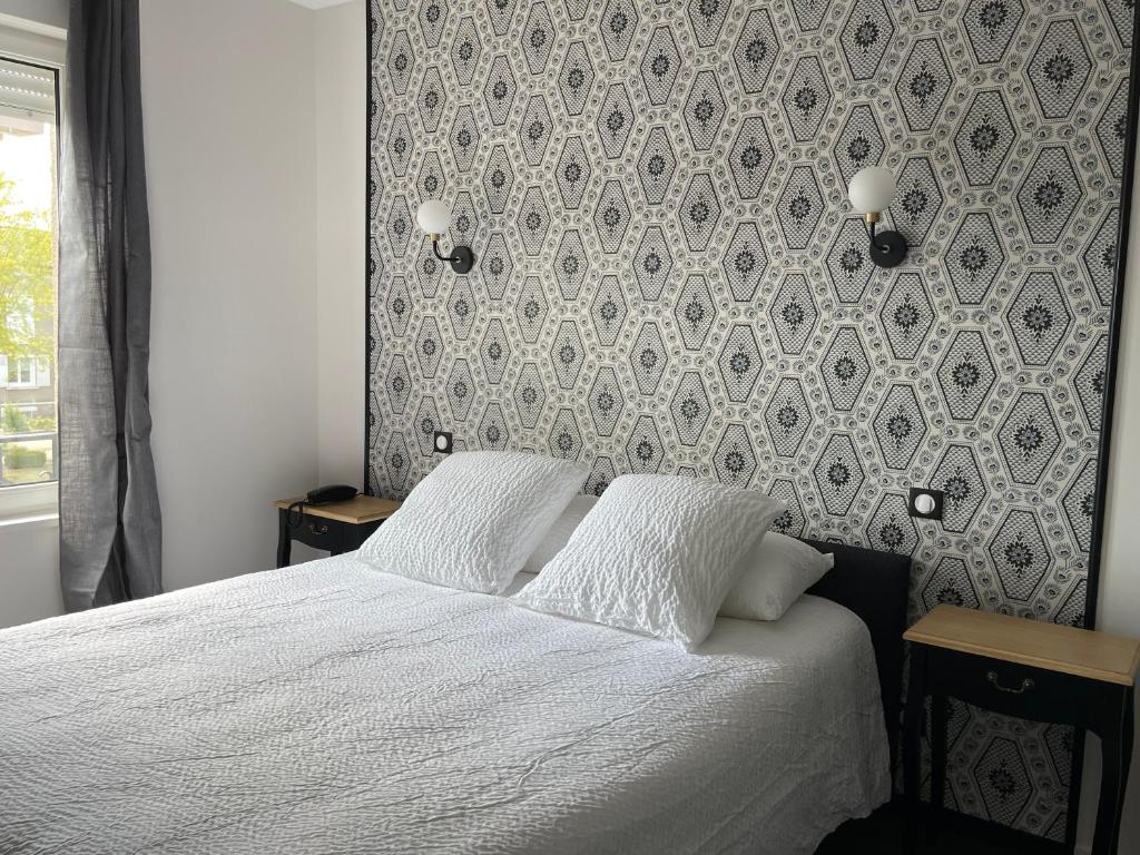 Postel nebo postele na pokoji v ubytování Hôtel de la Glane