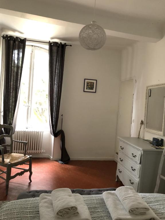 Postel nebo postele na pokoji v ubytování Château la Sable, chambres d'hôtes