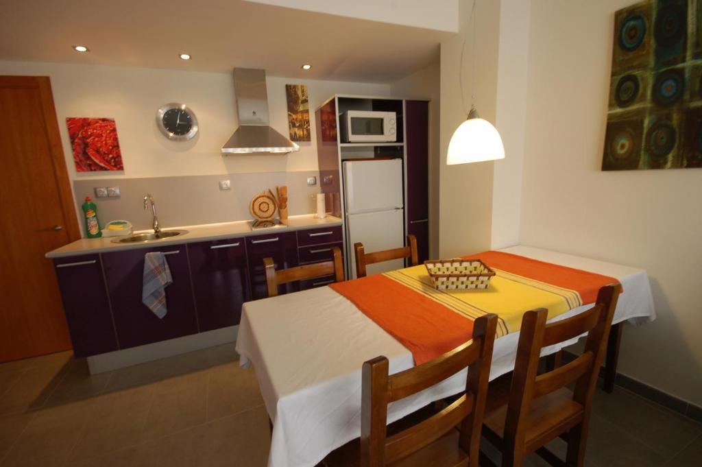 Kuchyň nebo kuchyňský kout v ubytování Sitges Apartment