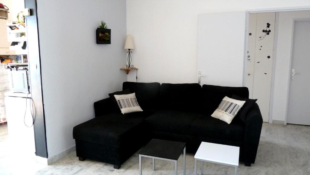 Posedenie v ubytovaní Appartement Climatisé Vue Mer Route des Sanguinaires