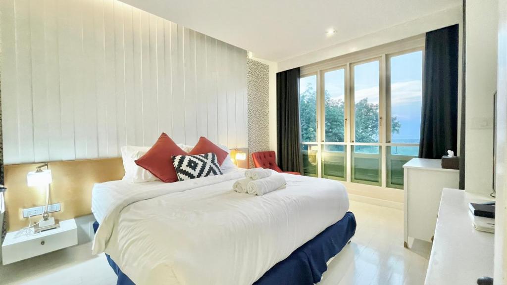 Postel nebo postele na pokoji v ubytování Phuket View Coffee and Resort