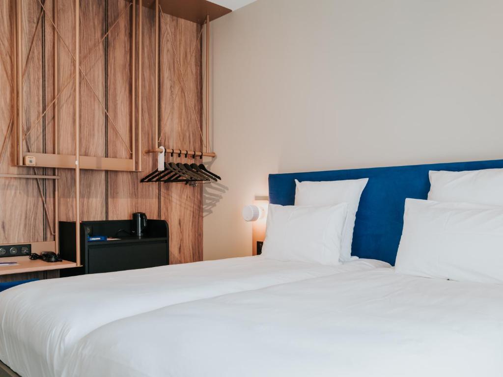Postel nebo postele na pokoji v ubytování Mercure Brest Centre Port