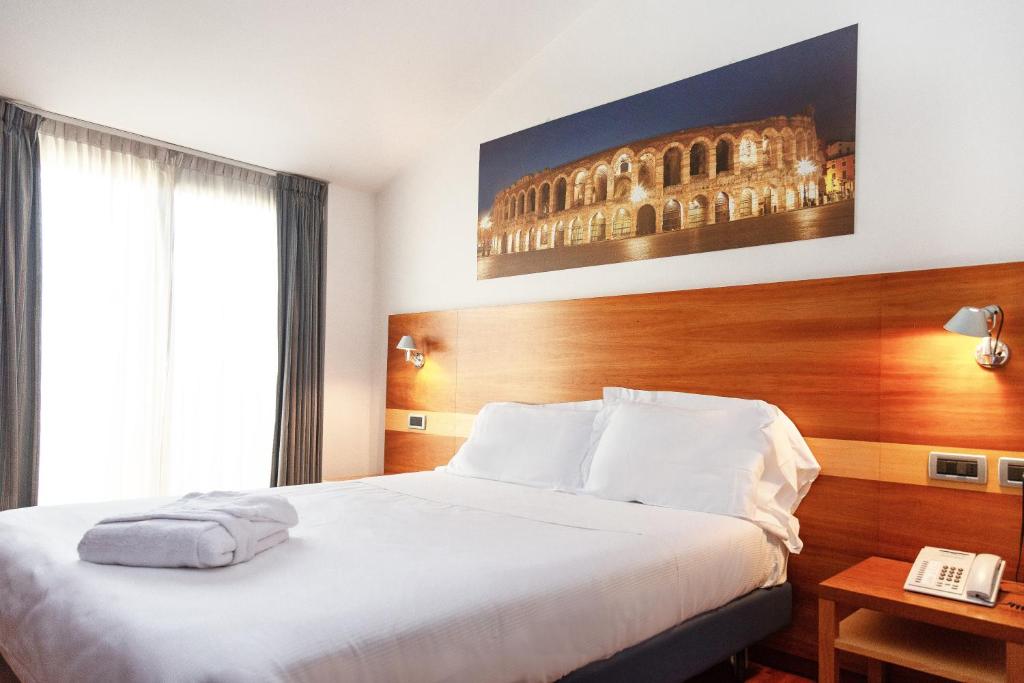 Postel nebo postele na pokoji v ubytování Best Western Hotel Fiera Verona