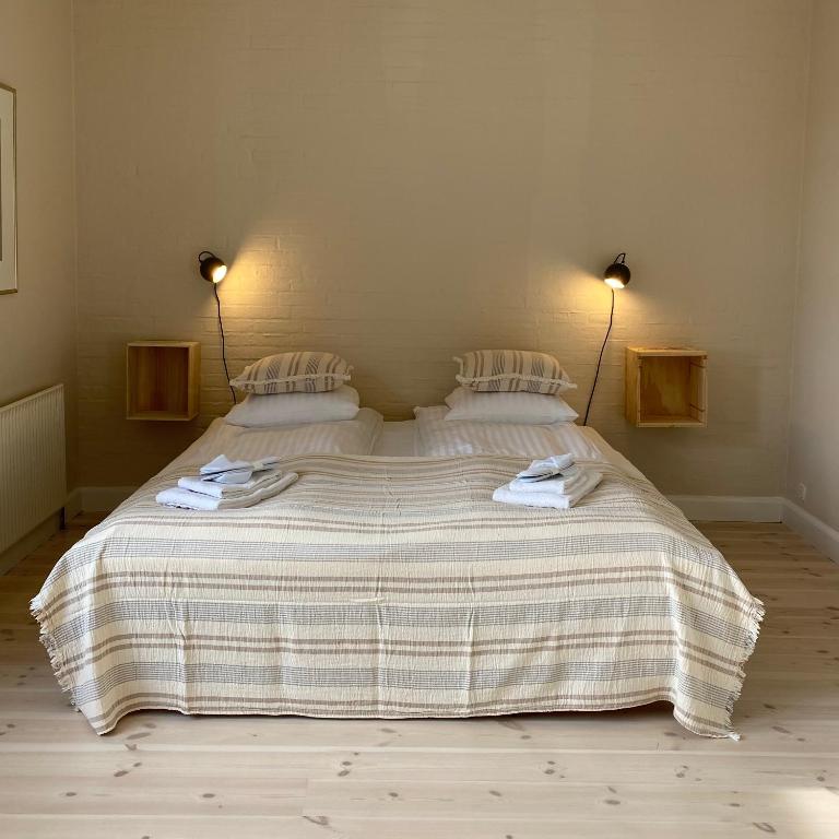 Voodi või voodid majutusasutuse Rødvig Kro og Badehotel toas