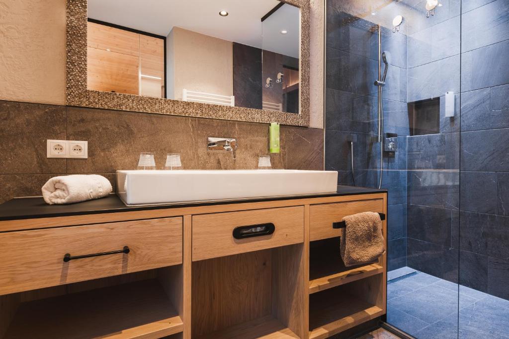Kúpeľňa v ubytovaní Hotel Riederhof- Urlaub mit WAU!