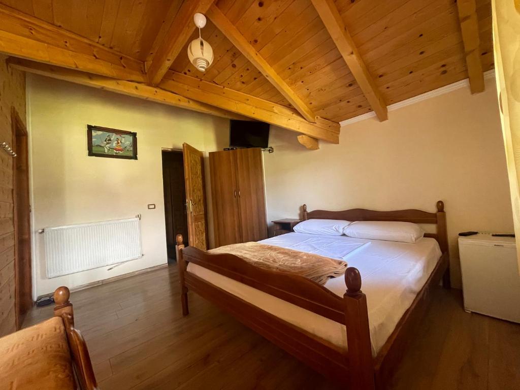 Postel nebo postele na pokoji v ubytování Vila Pepaj Razem