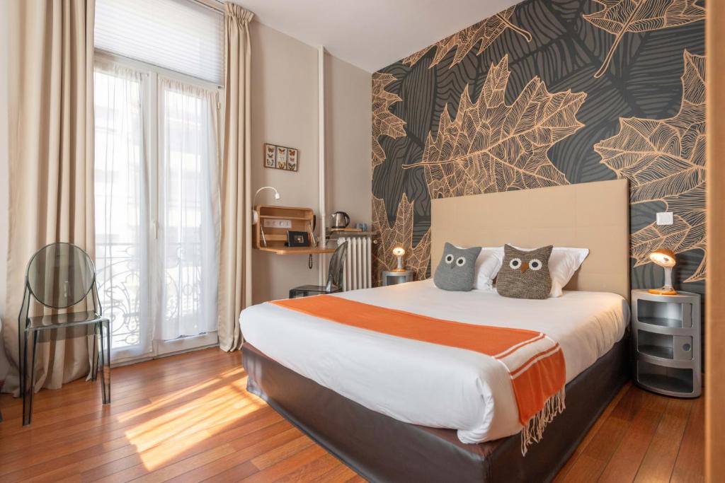 Postel nebo postele na pokoji v ubytování Hôtel Cecil - Adults only