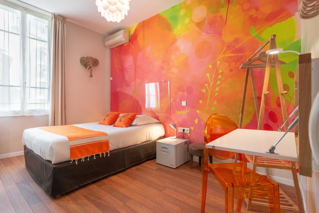 Postel nebo postele na pokoji v ubytování Hôtel Cecil - Adults only