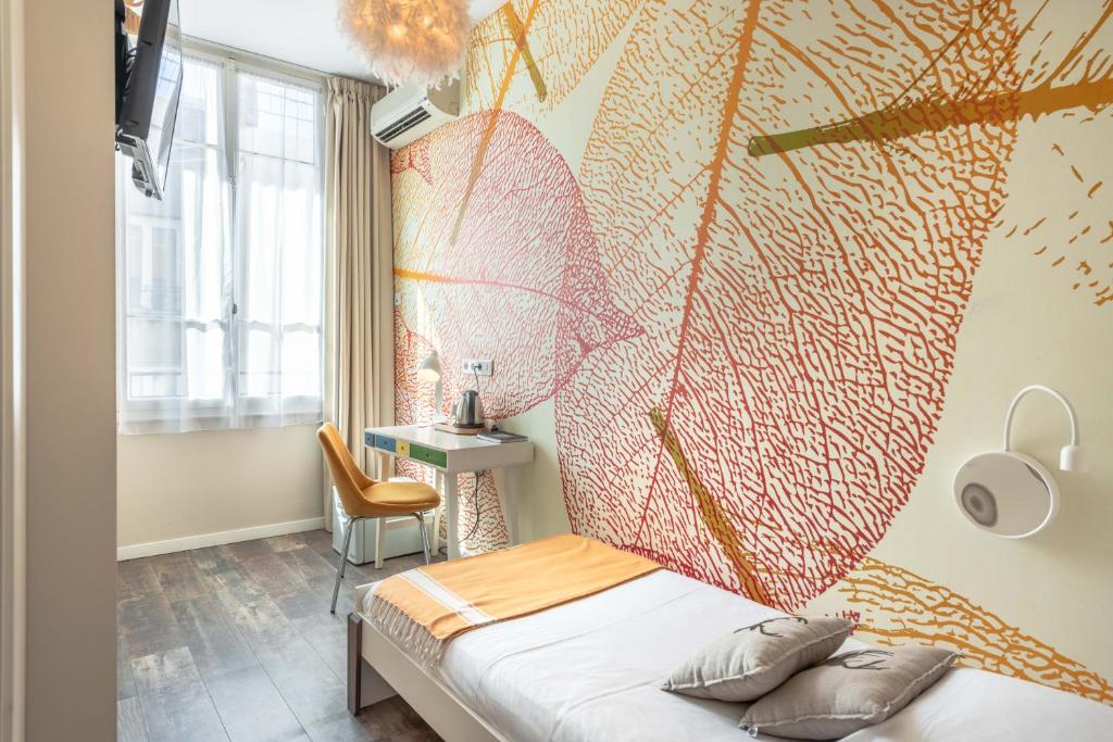 Postel nebo postele na pokoji v ubytování Hôtel Cecil - Adults only