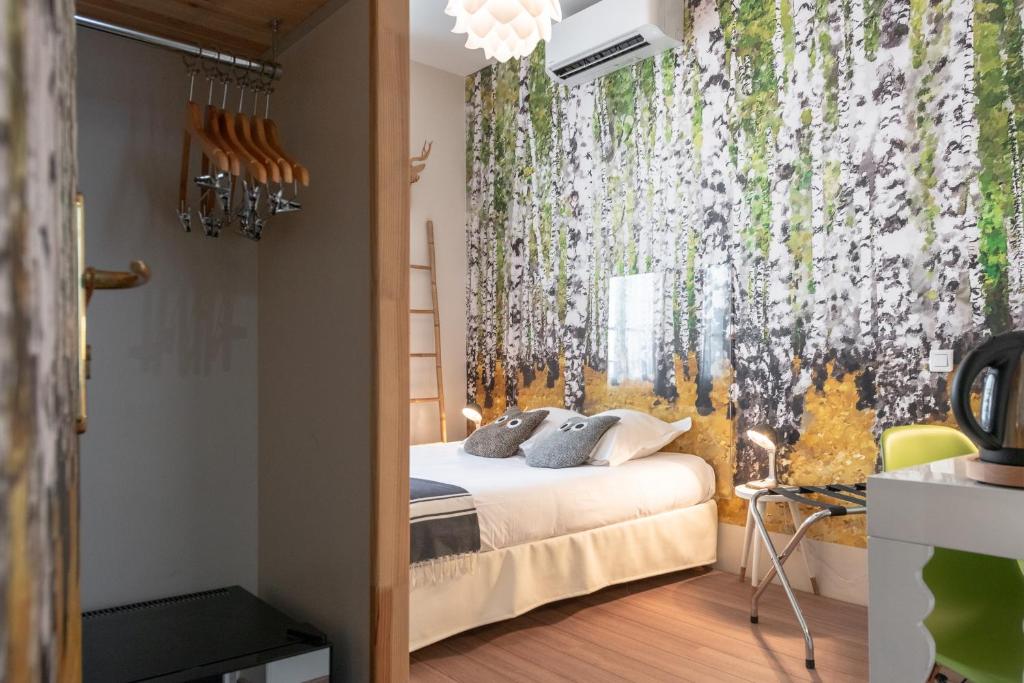 Postel nebo postele na pokoji v ubytování Hôtel Cecil - Adults only
